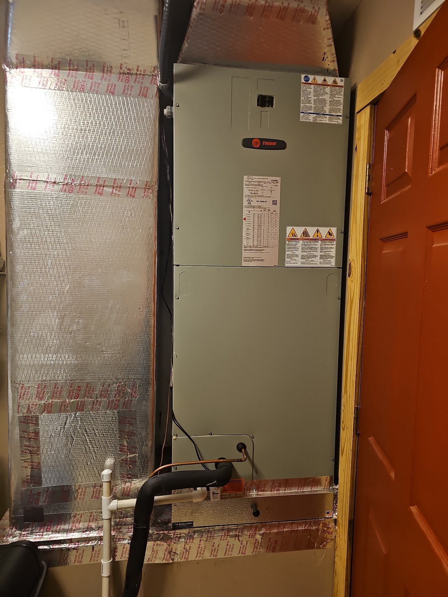 Trane air handler installed in garage